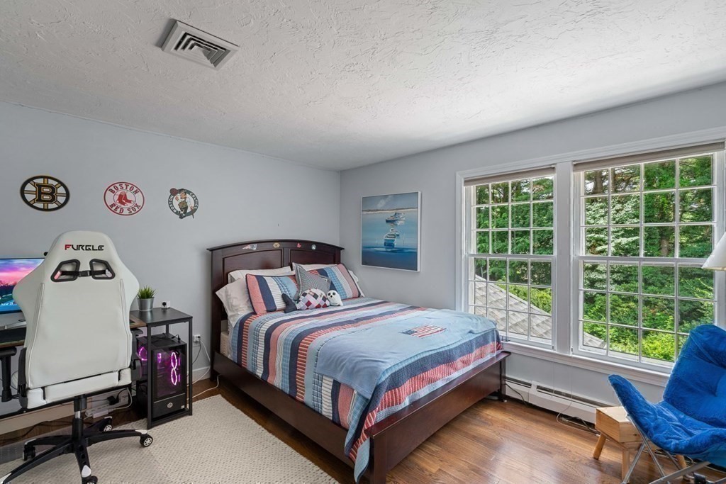 850 Boston Post Road Weston, MA 02493 - Photo 17 of 29 a bedroom with a bed and a window