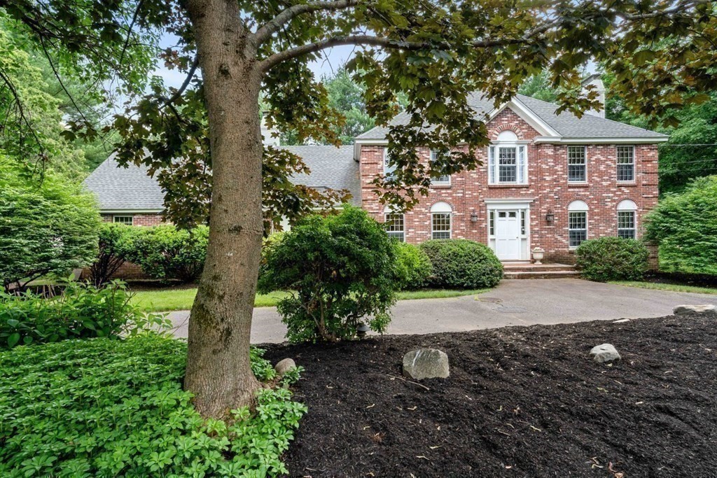 850 Boston Post Road Weston, MA 02493 - Photo 28 of 29 a front view of a house with a yard and trees