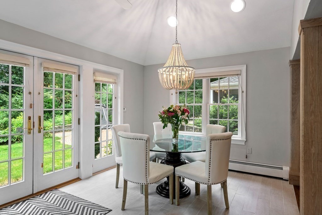 850 Boston Post Road Weston, MA 02493 - Photo 3 of 29 a view of a dining room with furniture window and wooden floor