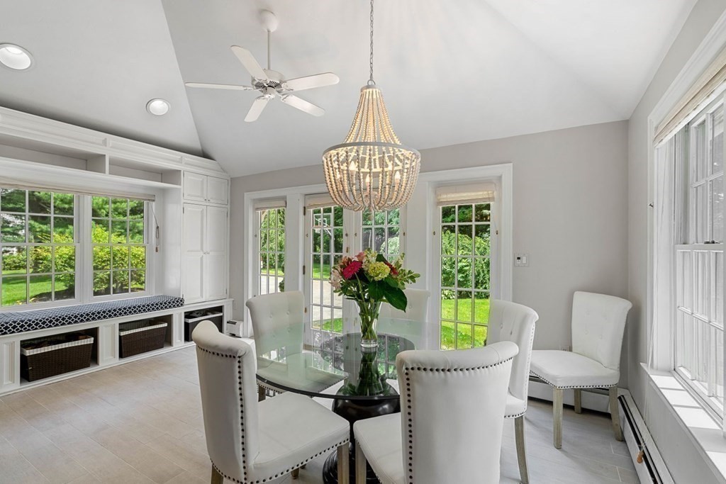 850 Boston Post Road Weston, MA 02493 - Photo 4 of 29 a dining room with furniture a livingroom and a chandelier