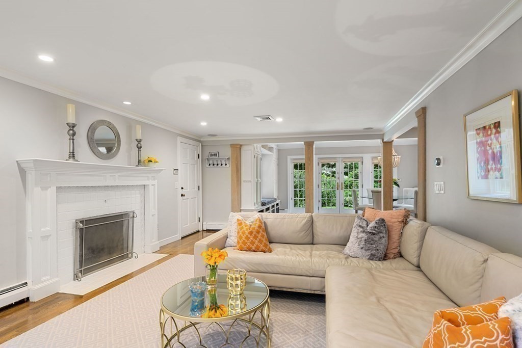 850 Boston Post Road Weston, MA 02493 - Photo 5 of 29 a living room with furniture and a fireplace