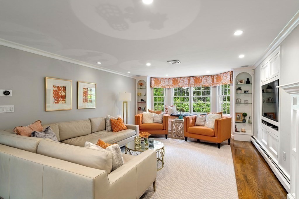 850 Boston Post Road Weston, MA 02493 - Photo 6 of 29 a living room with furniture and a large window