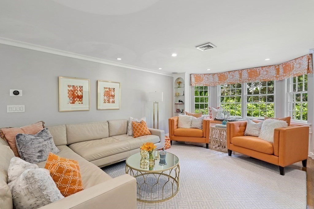 850 Boston Post Road Weston, MA 02493 - Photo 7 of 29 a living room with furniture and a large window