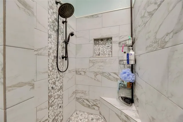 a spacious bathroom with a sink a mirror and vanity
