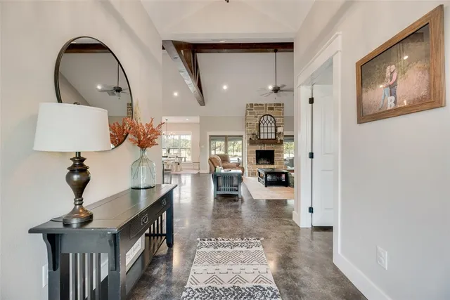 a living room with furniture and a rug