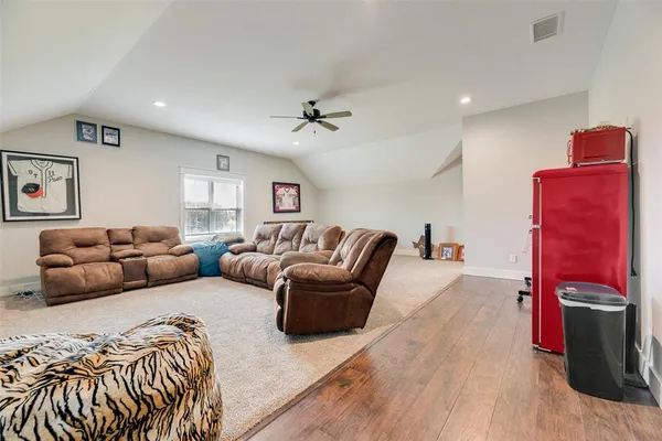 an outdoor space with swimming pool and furniture