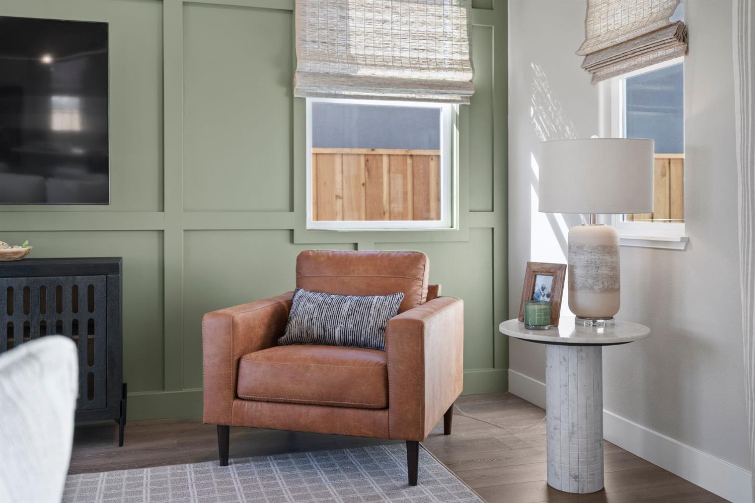 1815 Foster Lane Davis, CA 95616 - Photo 12 of 44 a living room with furniture a flat screen tv and a fireplace