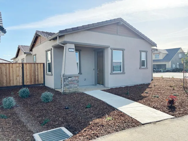 a house view with a backyard