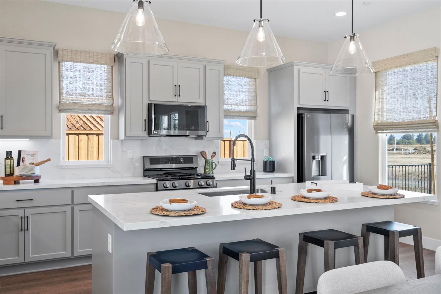 1815 Foster Lane Davis, CA 95616 - Photo 22 of 44 a kitchen with a sink stove and microwave