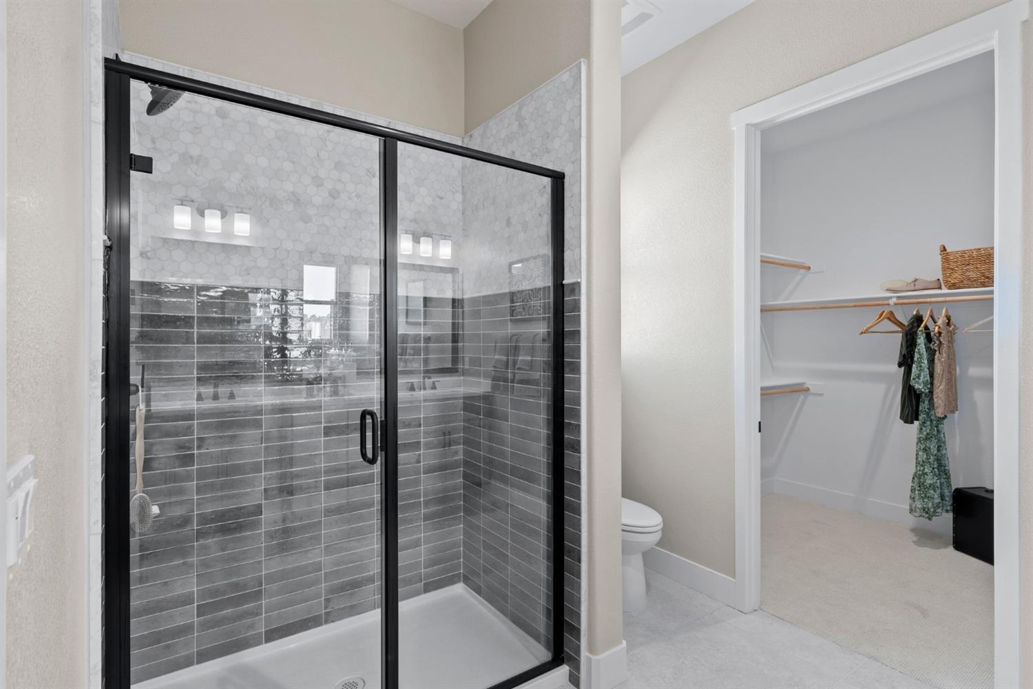 1815 Foster Lane Davis, CA 95616 - Photo 34 of 44 a bathroom with a glass shower door