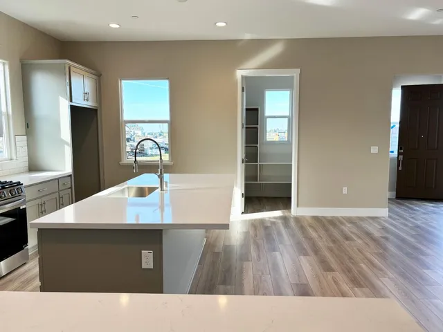 a bathroom with a sink a vanity and a mirror
