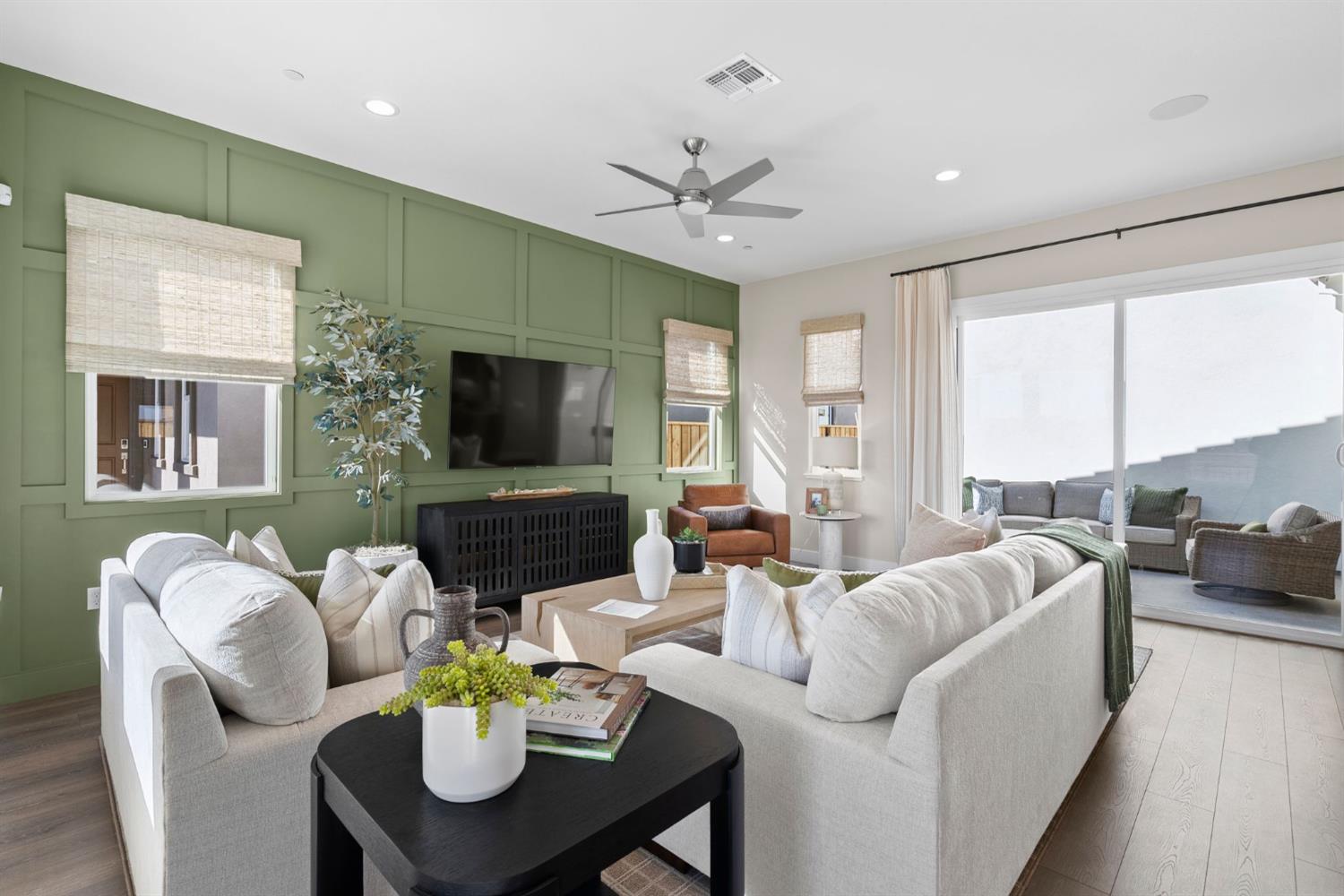 1815 Foster Lane Davis, CA 95616 - Photo 9 of 44 a living room with furniture a flat screen tv and a large window