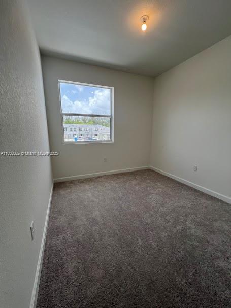 151 Southeast 11th Avenue, Unit 151 Florida City, FL 33034 - Photo 16 of 20 an empty room with a window