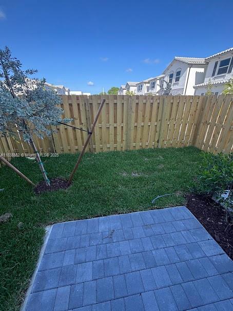 151 Southeast 11th Avenue, Unit 151 Florida City, FL 33034 - Photo 10 of 20 a view of a backyard