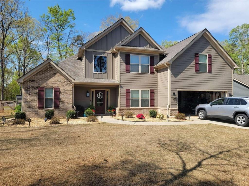 740 County Line-Auburn Road Winder, GA 30680 - Photo 1 of 1 a front view of a house with a patio