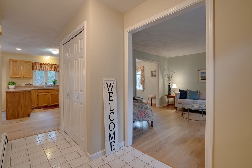 4 Carbone Circle Maynard, MA 01754 - Photo 2 of 38 a view of a living room kitchen and a window