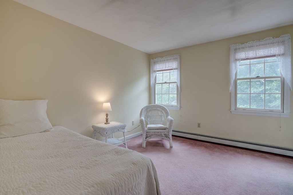 4 Carbone Circle Maynard, MA 01754 - Photo 22 of 38 a bedroom with a bed and a window