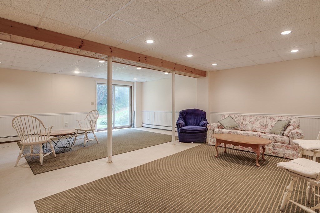 4 Carbone Circle Maynard, MA 01754 - Photo 25 of 38 a living room with furniture