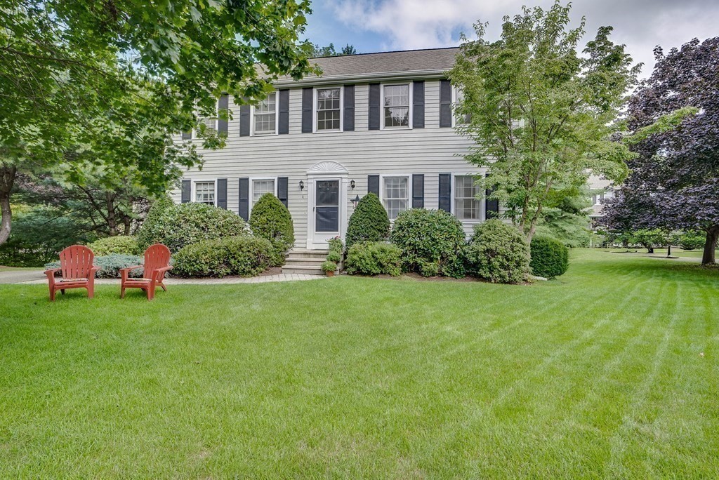 4 Carbone Circle Maynard, MA 01754 - Photo 29 of 38 a front view of house with yard and green space