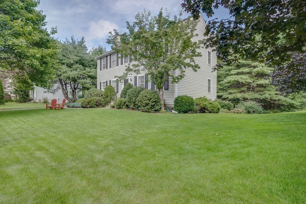 4 Carbone Circle Maynard, MA 01754 - Photo 32 of 38 a view of a garden with a house