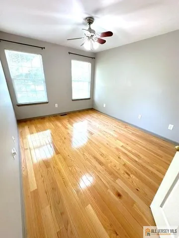 a view of an empty room and window