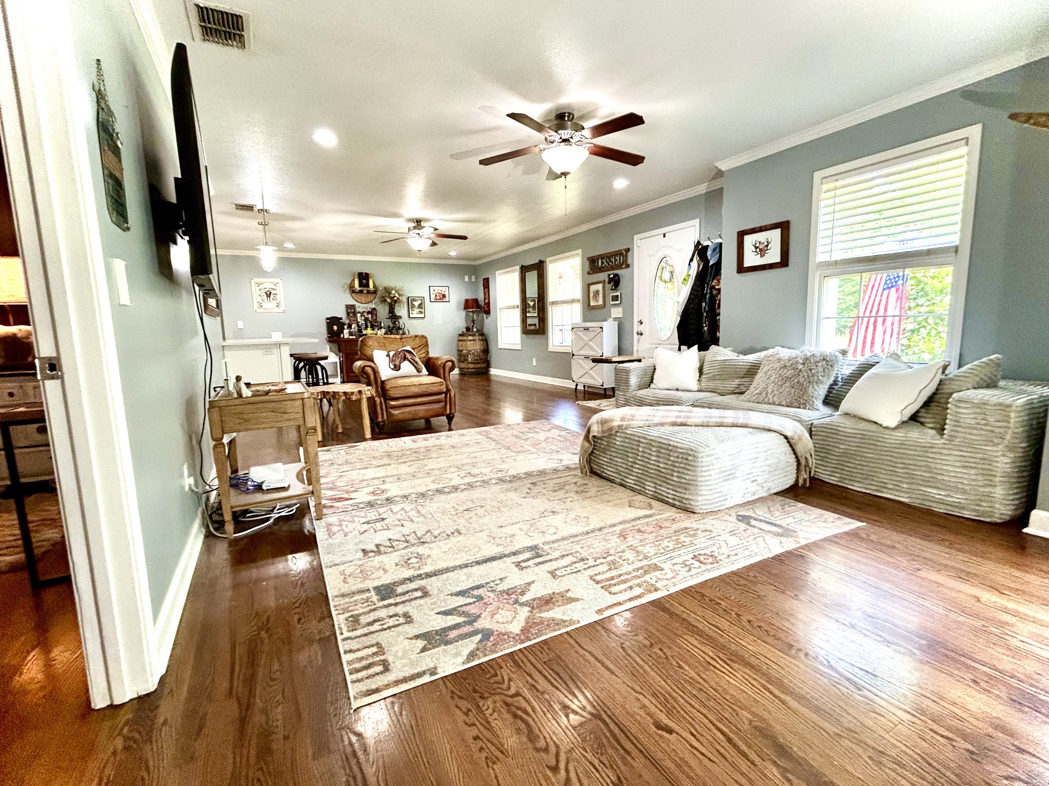1198 Ed Sanders Road Lynchburg, TN 37352 - Photo 5 of 36 a living room with furniture and a flat screen tv