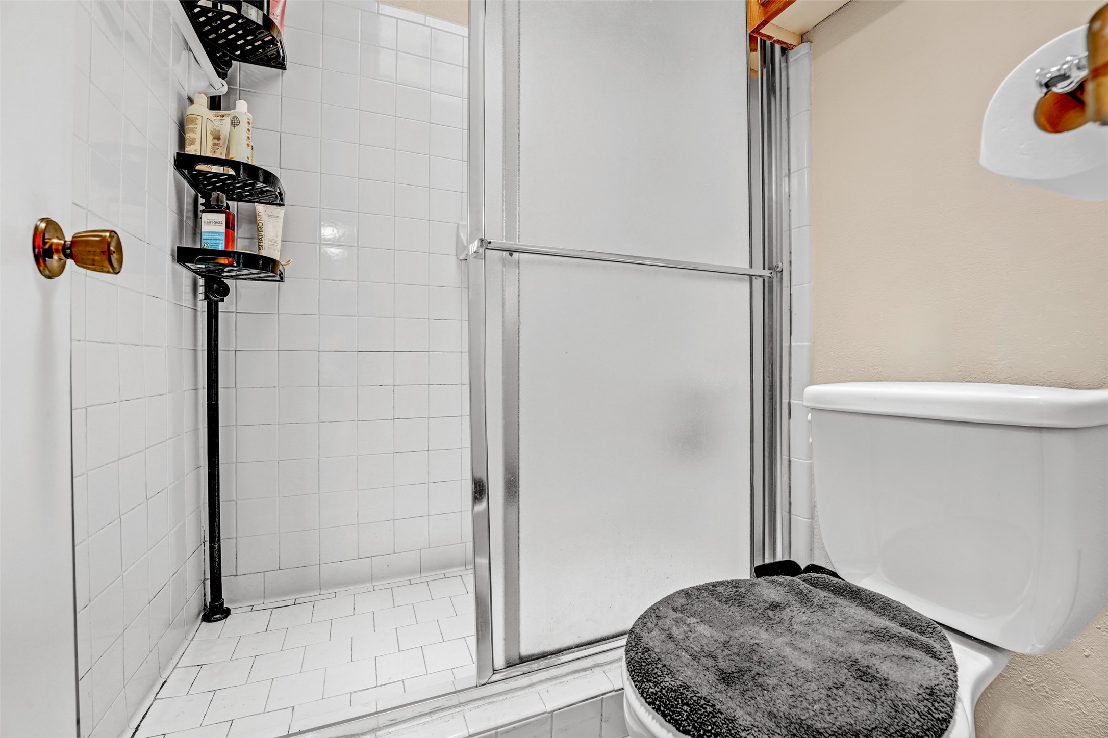 3801 Menchaca Road, Unit 24 Austin, TX 78704 - Photo 17 of 25 a bathroom with a shower