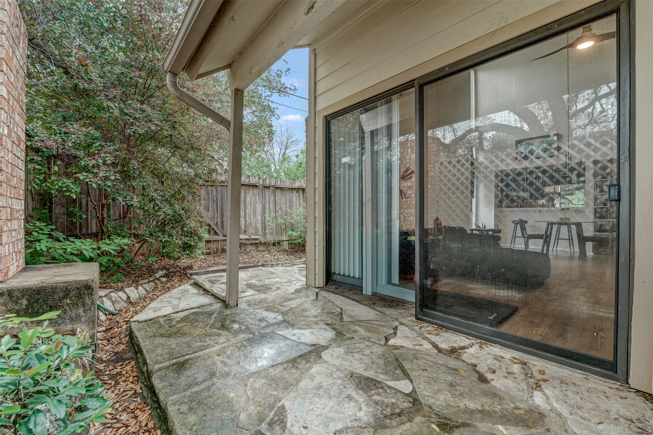 3801 Menchaca Road, Unit 24 Austin, TX 78704 - Photo 21 of 25 a front view of a house with a glass door
