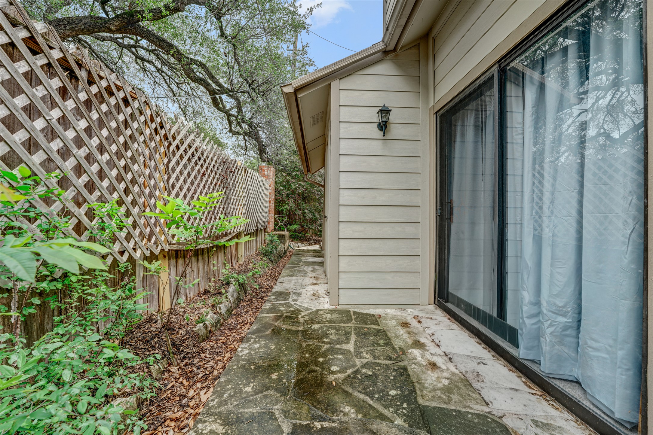 3801 Menchaca Road, Unit 24 Austin, TX 78704 - Photo 22 of 25 a yellow house with outdoor space