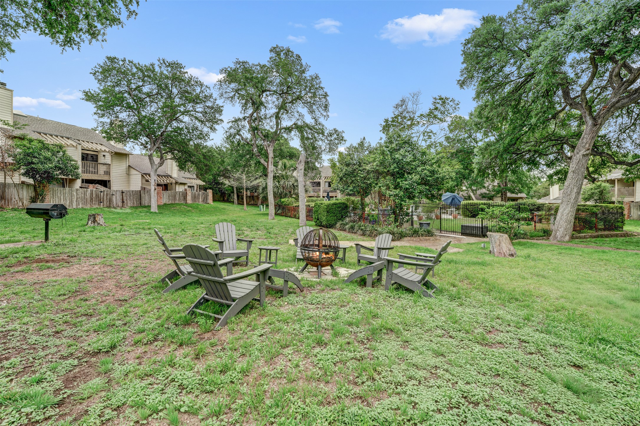 3801 Menchaca Road, Unit 24 Austin, TX 78704 - Photo 24 of 25 a view of a bench in the garden