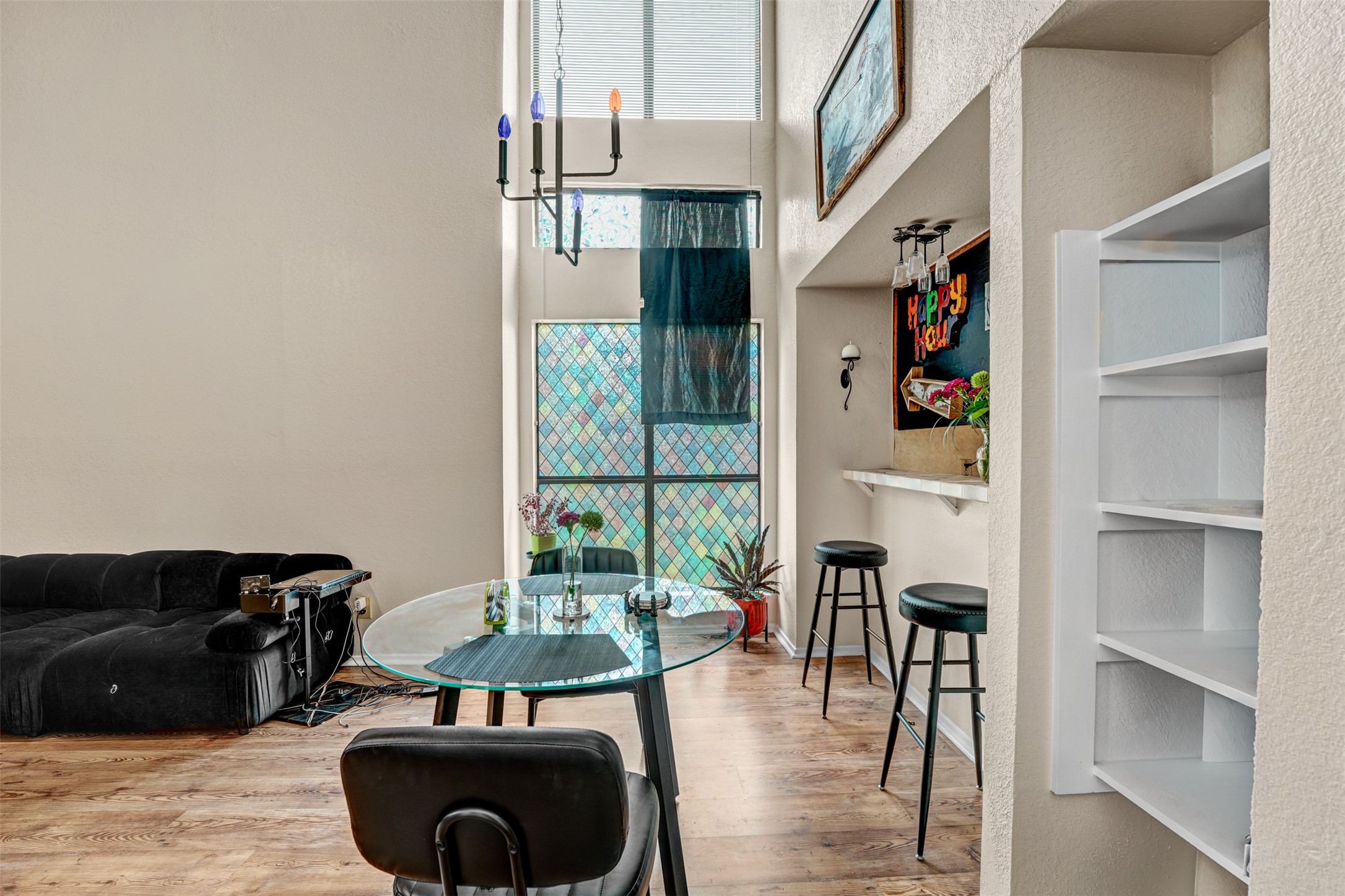 3801 Menchaca Road, Unit 24 Austin, TX 78704 - Photo 6 of 25 a view of a livingroom with furniture and floor to ceiling window