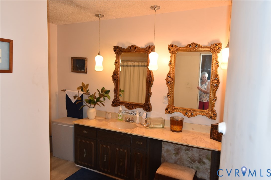 642 Star Street Pounding Mill, VA 24637 - Photo 11 of 20 Double vanity featuring a light-colored countertop