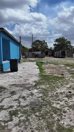 a view of a terrace with yard