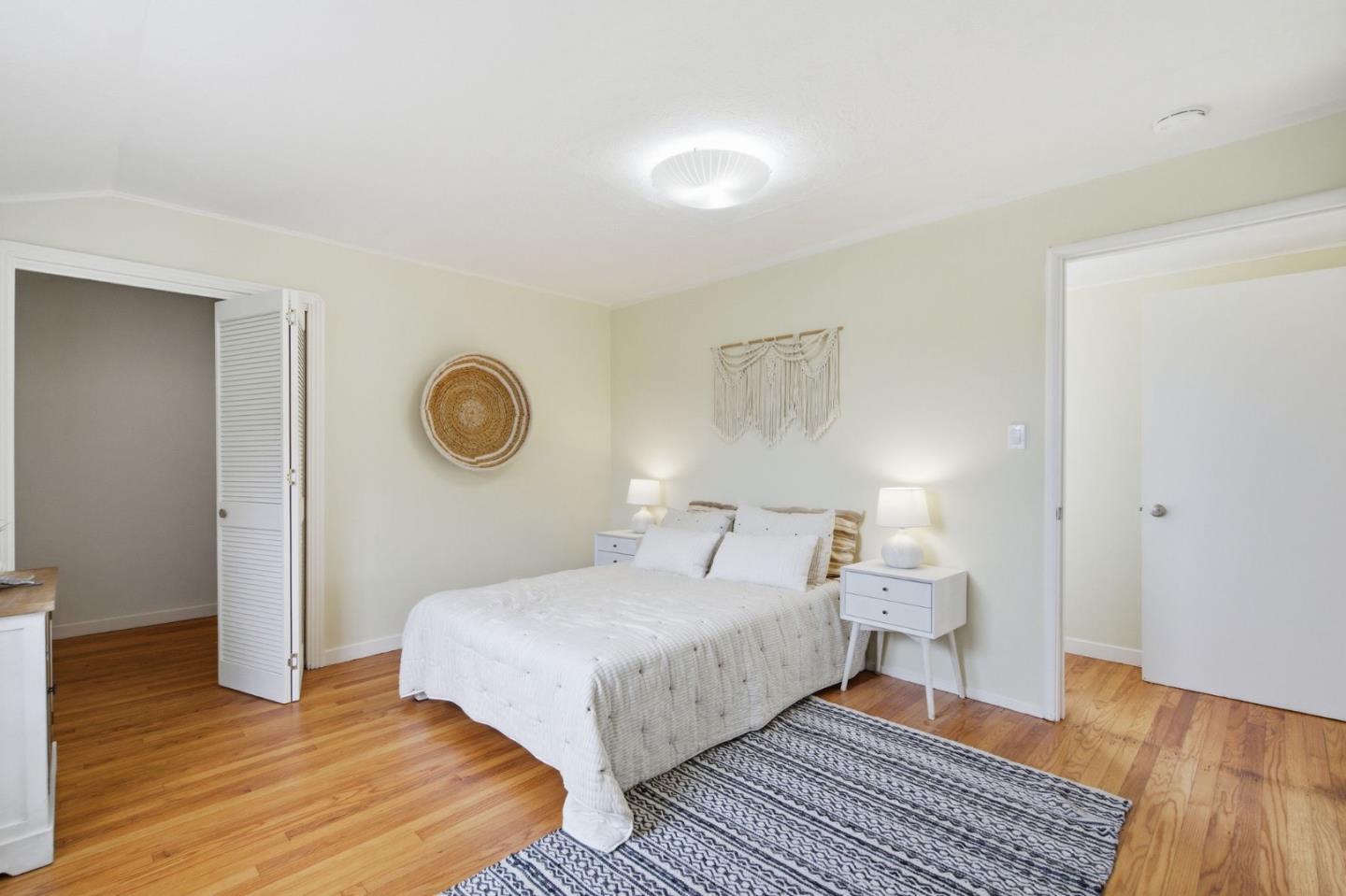 1263 Reservoir Road Pescadero, CA 94060 - Photo 28 of 66 a bedroom with a bed and a table