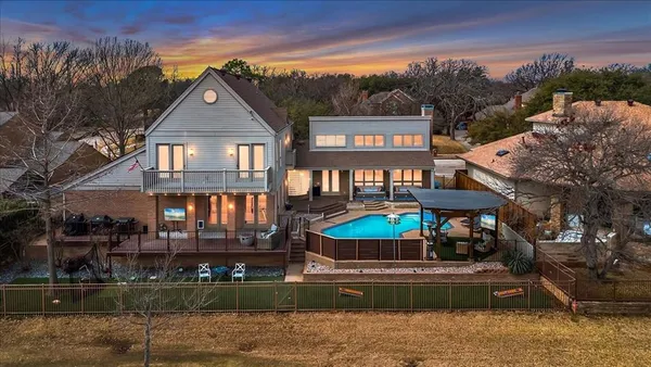 a front view of a house with swimming pool