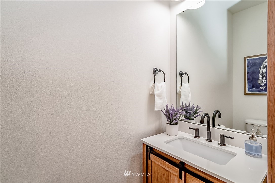 2624 Callow Road, Unit A Lake Stevens, WA 98258 - Photo 16 of 22 a bathroom with a sink and a mirror