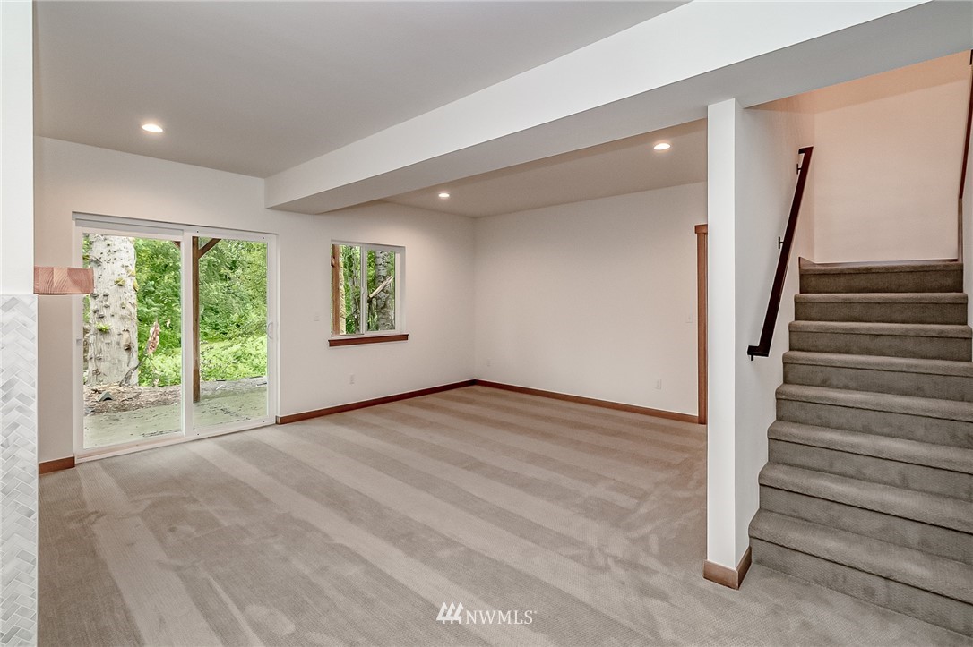 2624 Callow Road, Unit A Lake Stevens, WA 98258 - Photo 17 of 22 a view of an empty room with wooden floor and a window