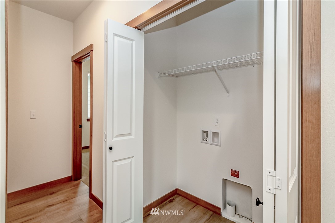 2624 Callow Road, Unit A Lake Stevens, WA 98258 - Photo 5 of 22 a view of a hallway with wooden floor