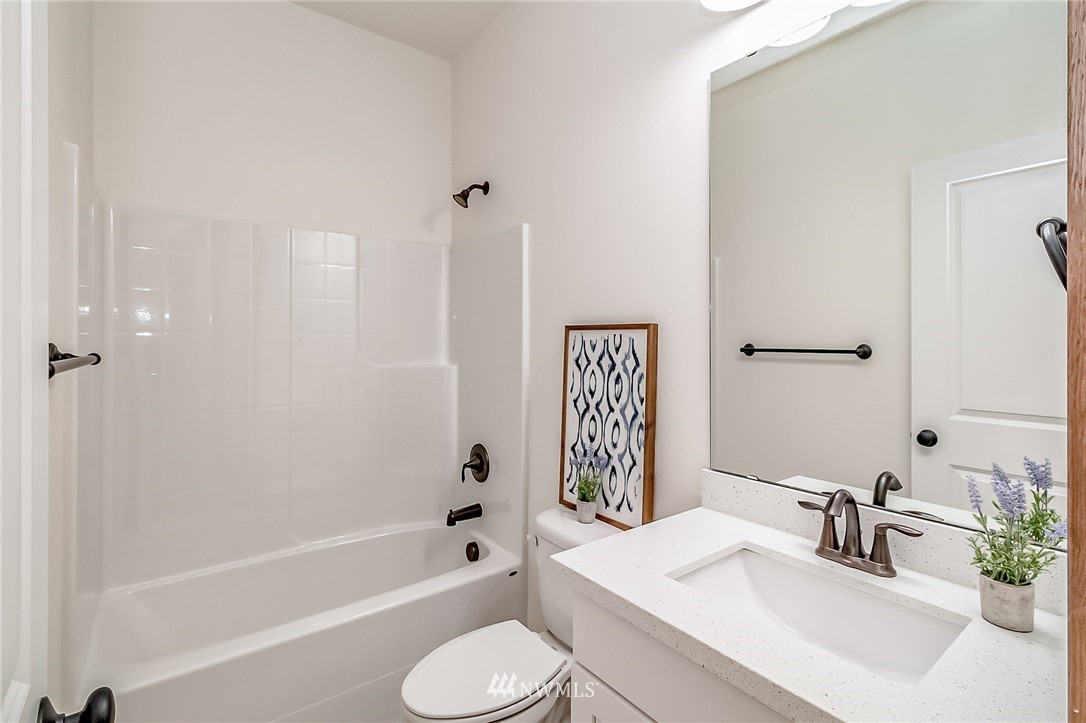 2624 Callow Road, Unit A Lake Stevens, WA 98258 - Photo 8 of 22 a bathroom with a sink toilet and shower