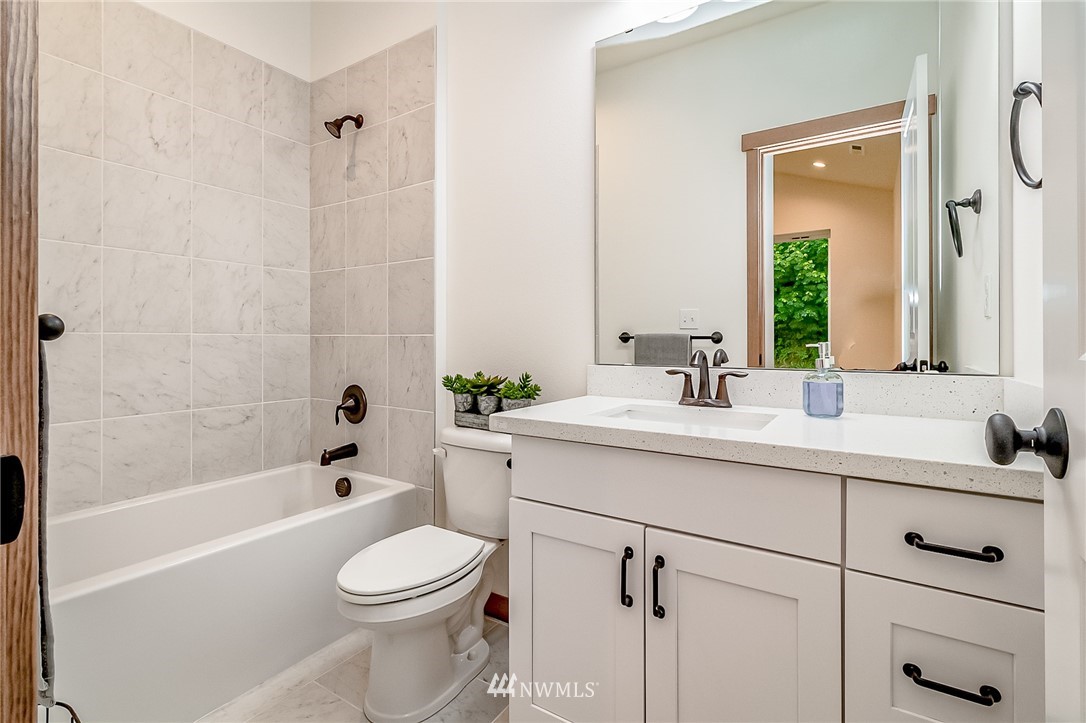 2624 Callow Road, Unit A Lake Stevens, WA 98258 - Photo 9 of 22 a bathroom with a sink a toilet and shower
