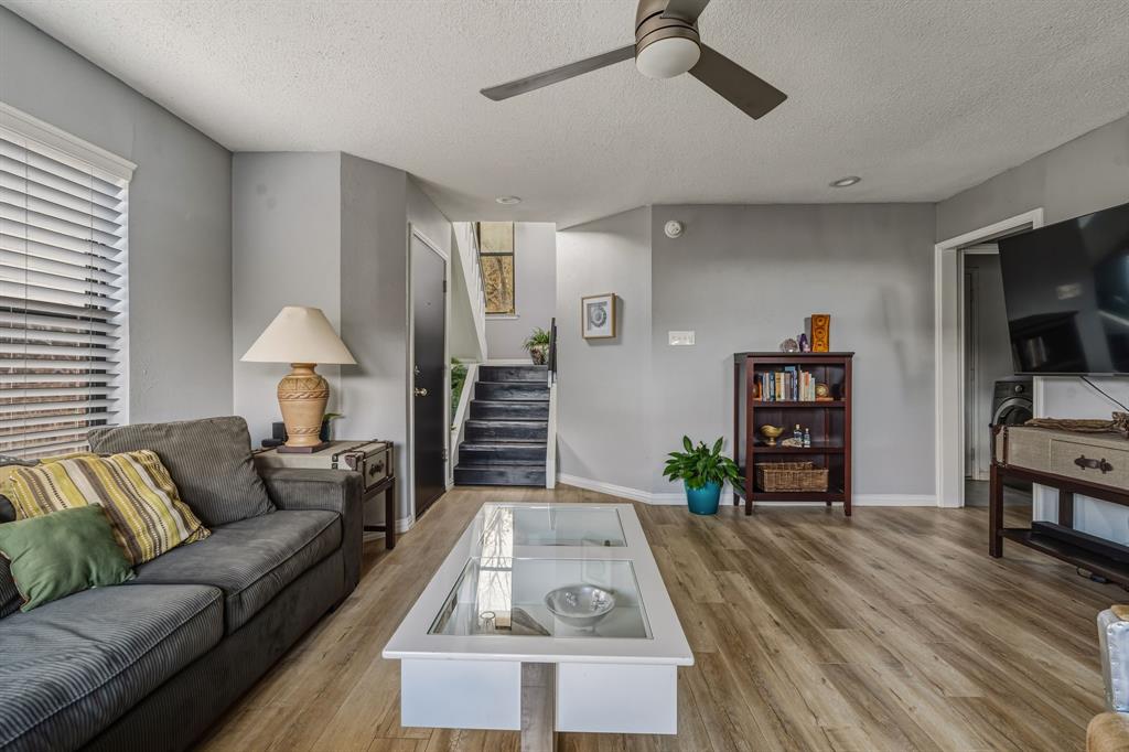 705 Via Miramonte Mesquite, TX 75150 - Photo 8 of 28 a living room with furniture and a flat screen tv