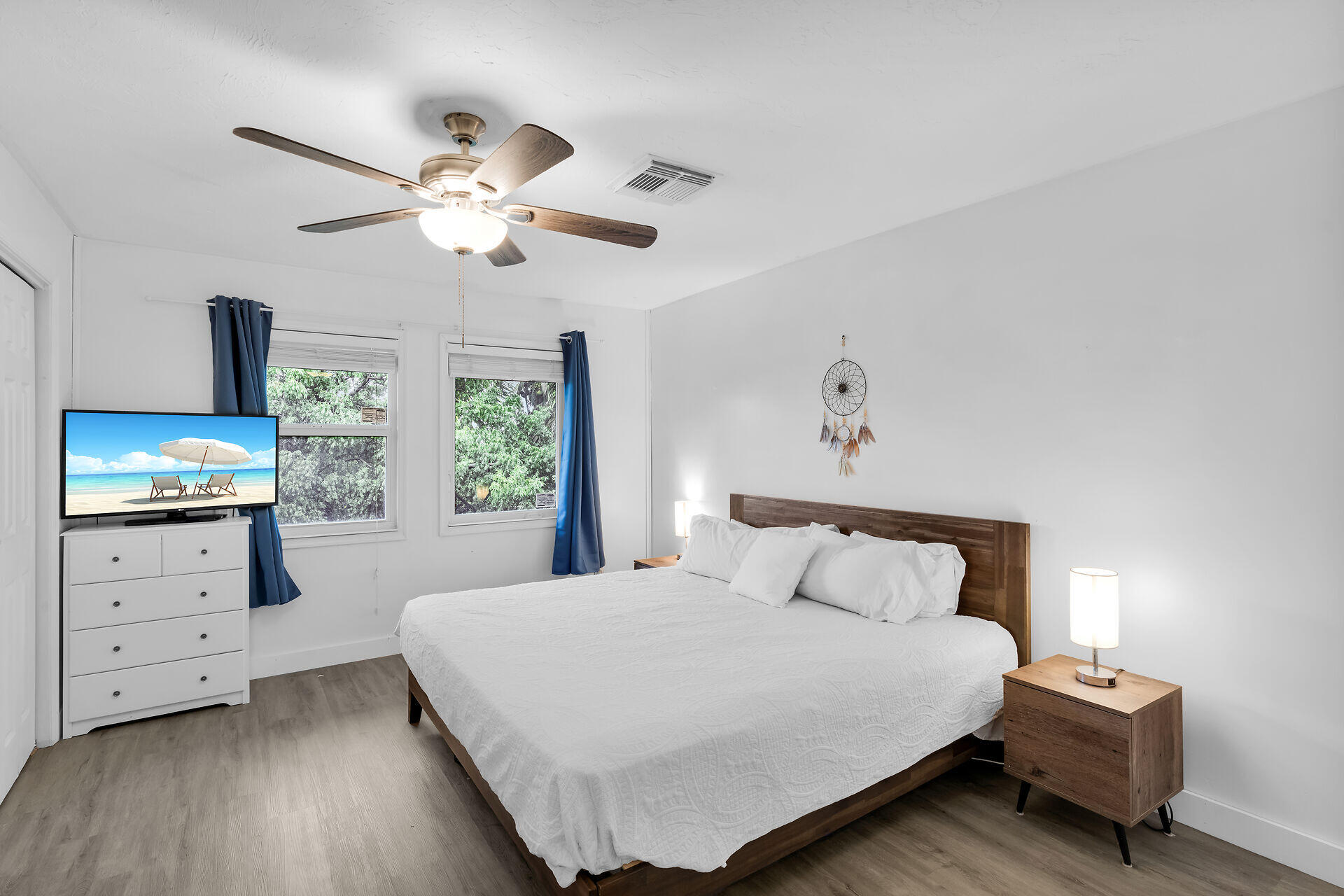 111 Stirrup Key Woods Road, Unit 2B1 Marathon, FL 33050 - Photo 20 of 36 a bedroom with a bed and a tv on the dresser