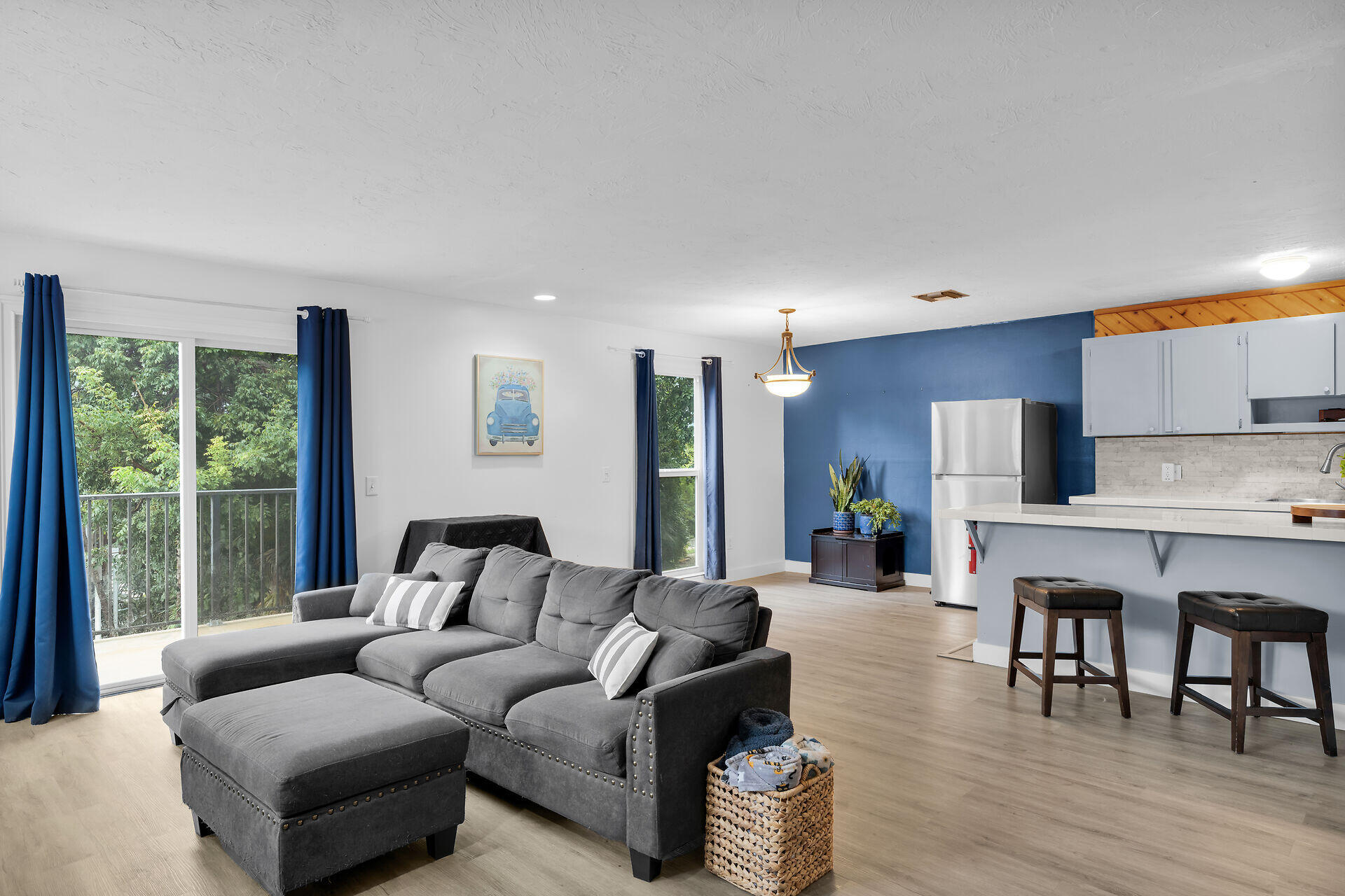 111 Stirrup Key Woods Road, Unit 2B1 Marathon, FL 33050 - Photo 3 of 36 a living room with furniture and a large window