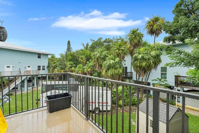 a view of a balcony with lake view