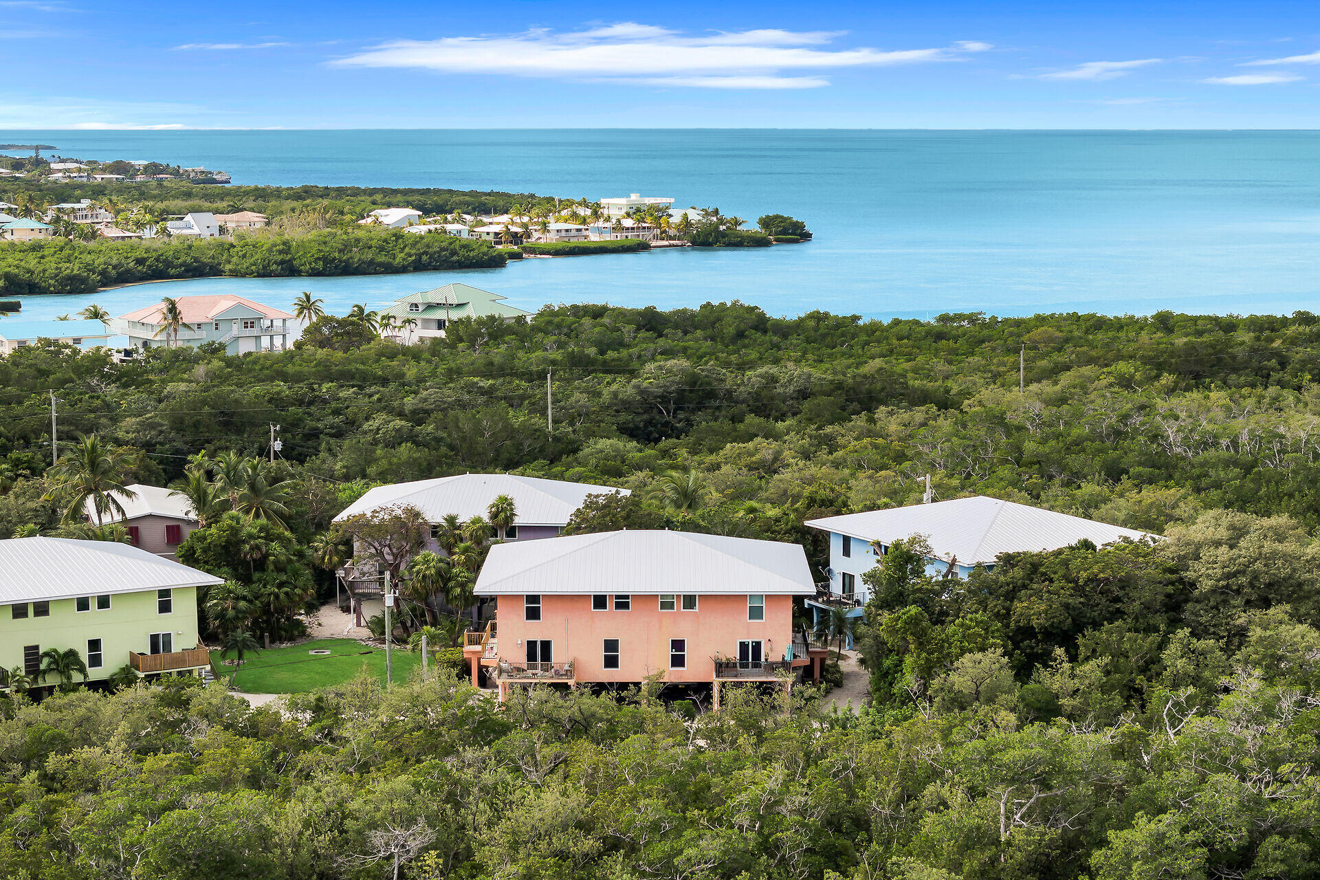 111 Stirrup Key Woods Road, Unit 2B1 Marathon, FL 33050 - Photo 6 of 36 a view of a lake with houses
