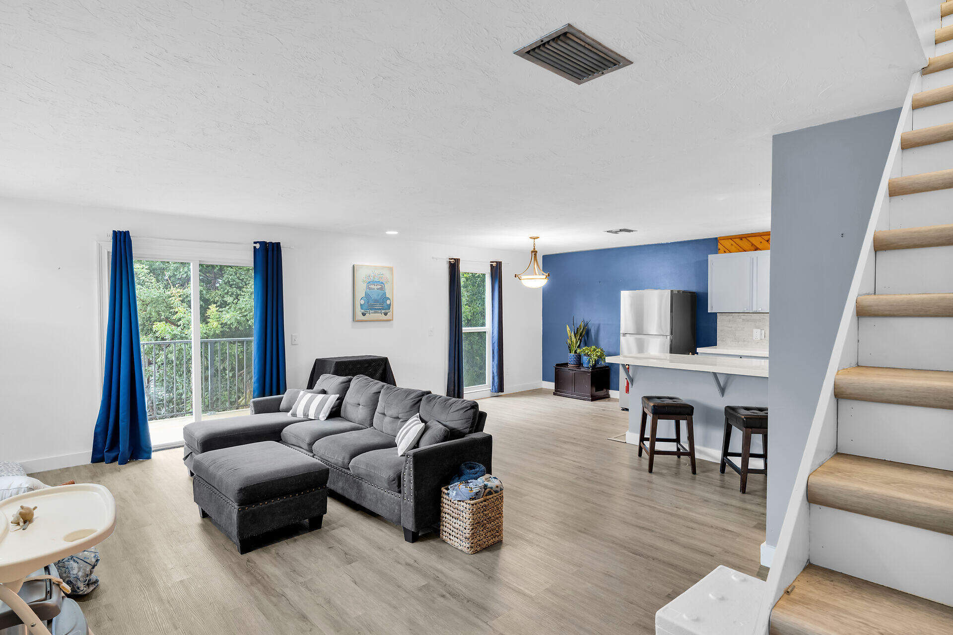 111 Stirrup Key Woods Road, Unit 2B1 Marathon, FL 33050 - Photo 7 of 36 a living room with furniture or couch and a wooden floor