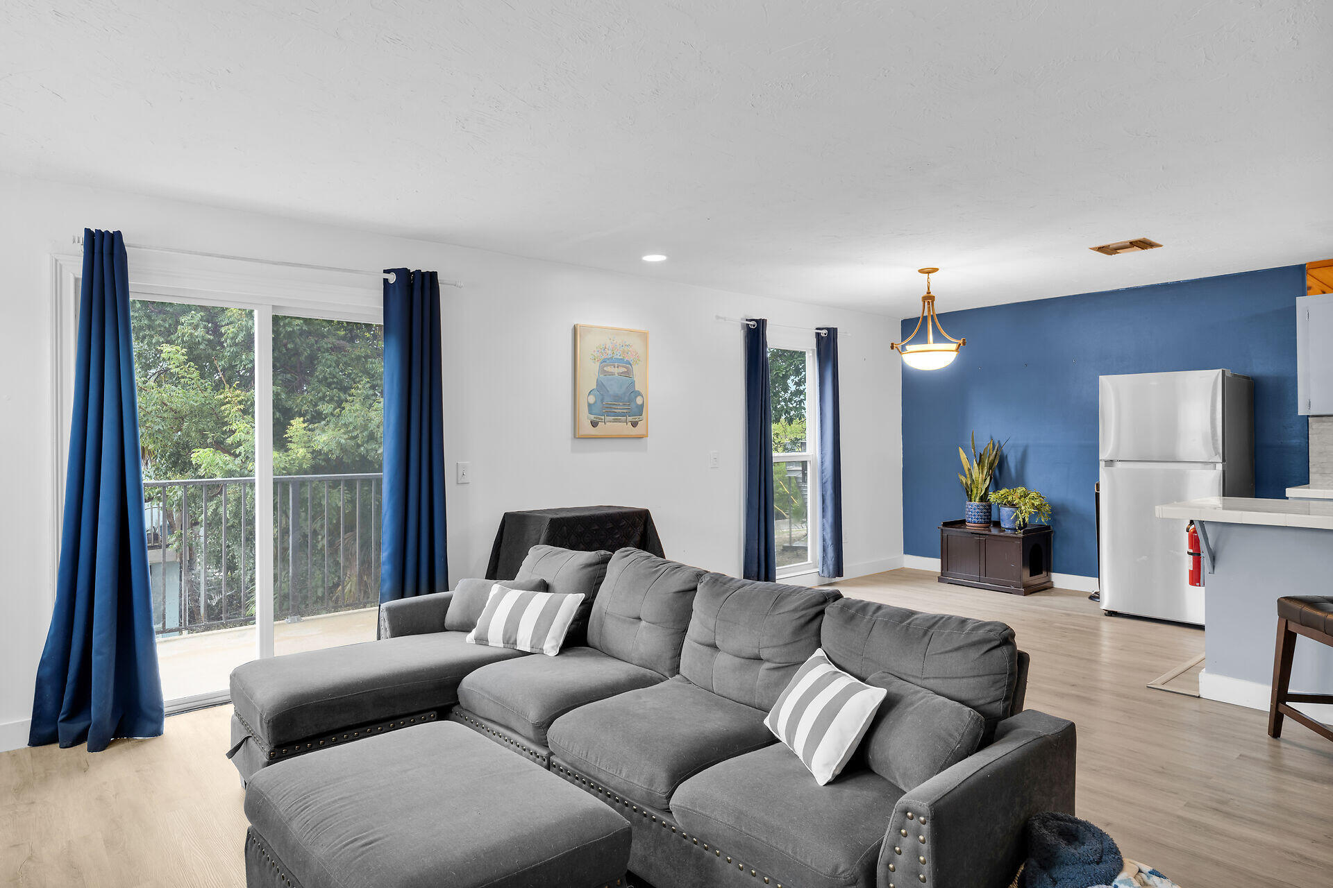 111 Stirrup Key Woods Road, Unit 2B1 Marathon, FL 33050 - Photo 9 of 36 a living room with furniture and a flat screen tv
