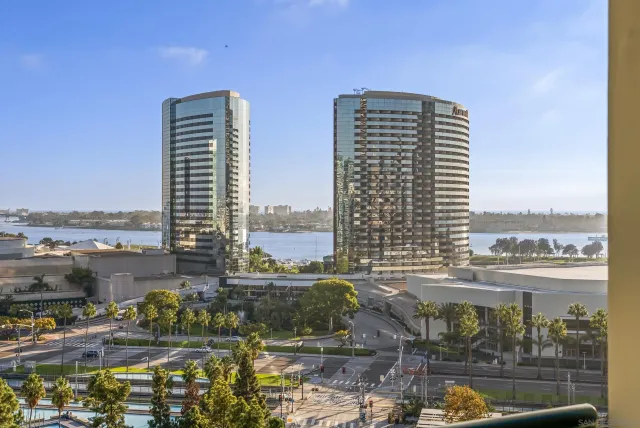 a view of a city with tall buildings