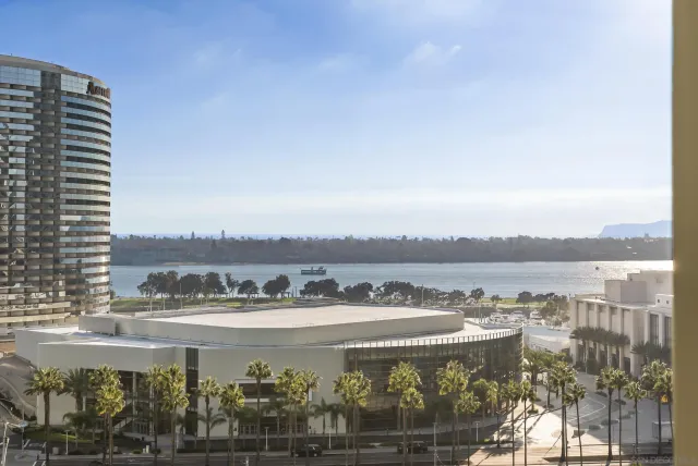 a view of a lake with building in front of it