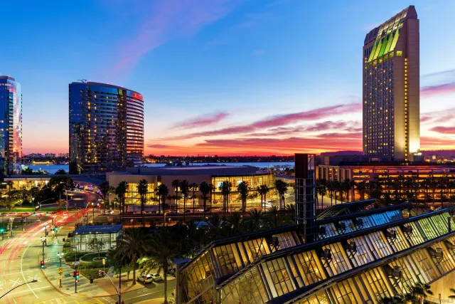 a view of a city with tall buildings